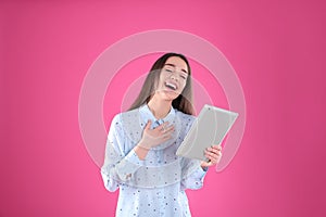 Woman using tablet for video chat