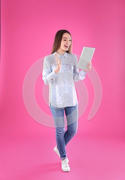 Woman using tablet for video chat