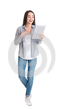 Woman using tablet for video chat on white