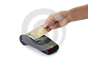 Woman using terminal for contactless payment with credit card