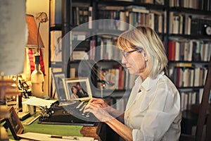 Woman using a typing machine