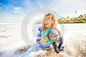 Woman using underwater camera