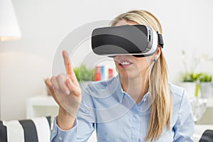 Woman using virtual reality glasses