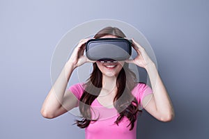 Woman using VR headset glasses