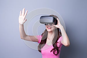 Woman using VR headset glasses