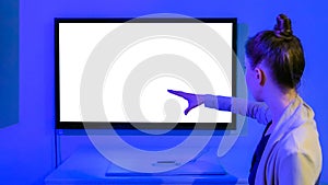 Woman using white blank screen with no touch control photo