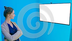 Woman using white empty interactive display