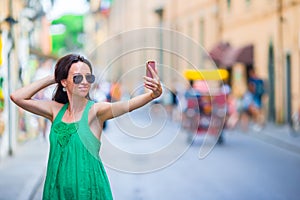 Woman on vacation travel. Smiling happy caucasian girl having fun laughing during holidays in Rome, Italy, Europe.