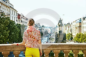 Woman on Vaclavske namesti in Prague Czech Republic looking