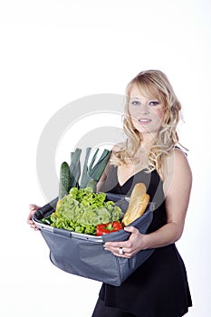 Woman with vegetables and fruit