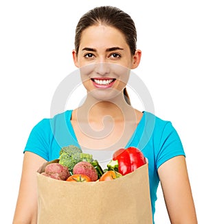 Woman With Vegetables Over White Background