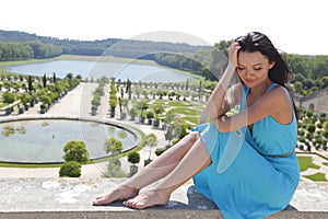 Woman in Versailles gardens France