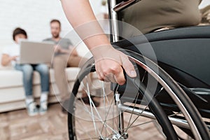 Woman veteran in wheelchair returned from army. Close-up photo veteran woman in a wheelchair.