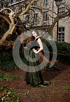 Woman in Victorian dress in the park