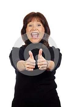 Woman in victorious expression with thumbs raised