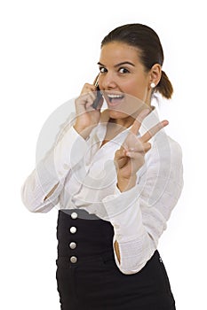 Woman with victory gesture and mobile phone