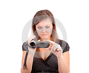 Woman with a videocamera,isolated. photo