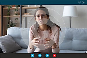 Woman videoconferencing app user talking with friend by video call