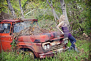 Woman on vinatge truck