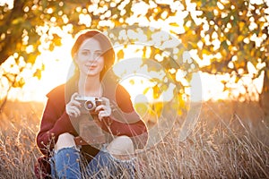 Woman with vintage camera