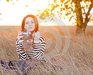 Woman with vintage camera