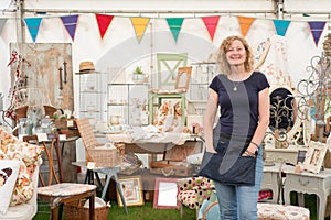 Woman by a vintage crafts stall