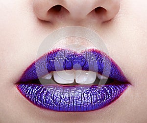Woman with violet lips makeup