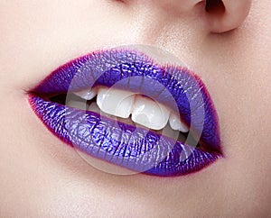 Woman with violet lips makeup