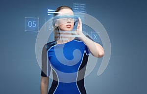 Woman in virtual reality 3d glasses with charts