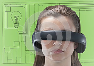 Woman in virtual reality headset against green and grey hand drawn wall with pictures