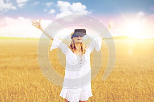 Woman in virtual reality headset on cereal field