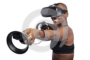Woman in Virtual Reality Holding VR Wands or Controllers