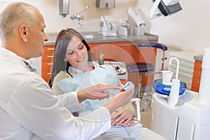 Woman visit dentist orthodontic surgery photo