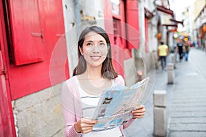 Woman visit Rua da Felicidade in macao city photo