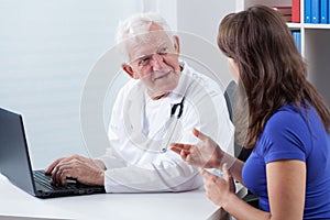 Woman visiting experienced physician