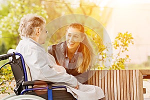 Woman visiting grandmother in nursing home