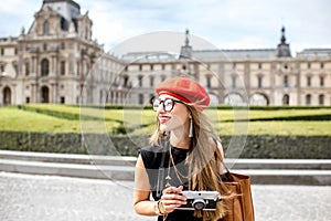 Woman visiting Louvre in Paris