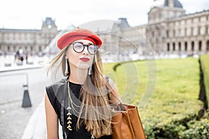 Woman visiting Louvre in Paris