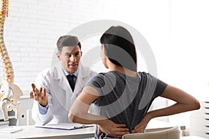 Woman visiting orthopedist in medical office