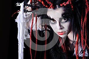 Woman with voodoo shaman make-up