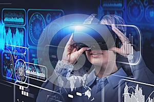 Woman in VR glasses, digital interface