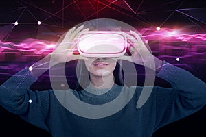 Woman in VR goggles, red graph