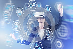 Woman in VR headset, digital business interface