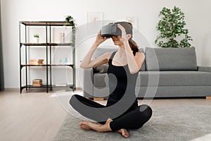 Woman in VR headset doing fitness