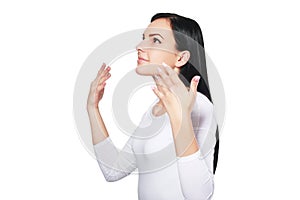 Woman wafting air to nostrils