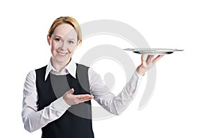 Woman waiter with metal cloche lid cover