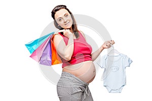 Woman waiting for the birth of her son, portrait after shopping