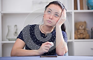 Woman waiting for phone call