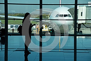 Woman waiting plane photo