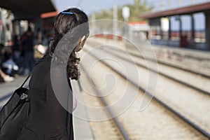 Woman waiting for train